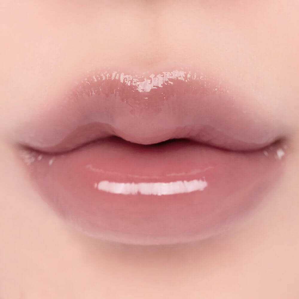 Стойкий блеск для эффекта стеклянных губ rom&nd Glasting Color Gloss 05 Dim Mauve